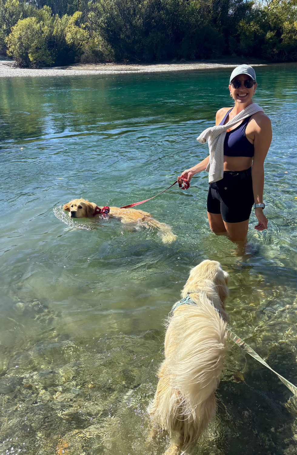 Lightweight outfit for summer adventure travel in New Zealand including swim top and hiking shorts