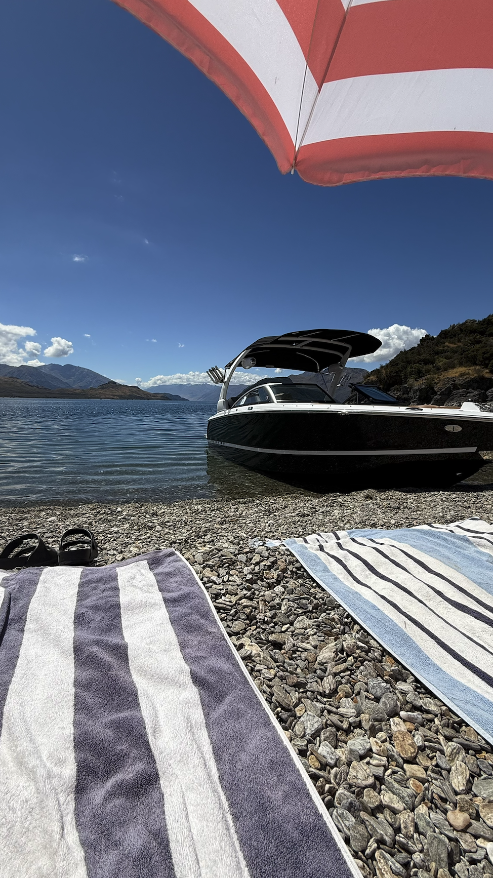 Boating on clear blue Lake Wanaka New Zealand