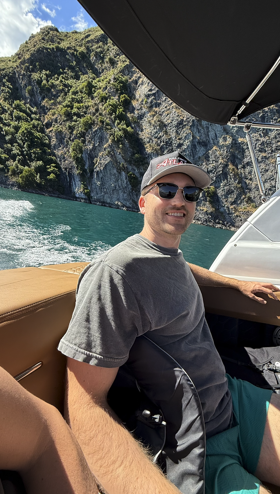 Man on boat in Wanaka New Zealand