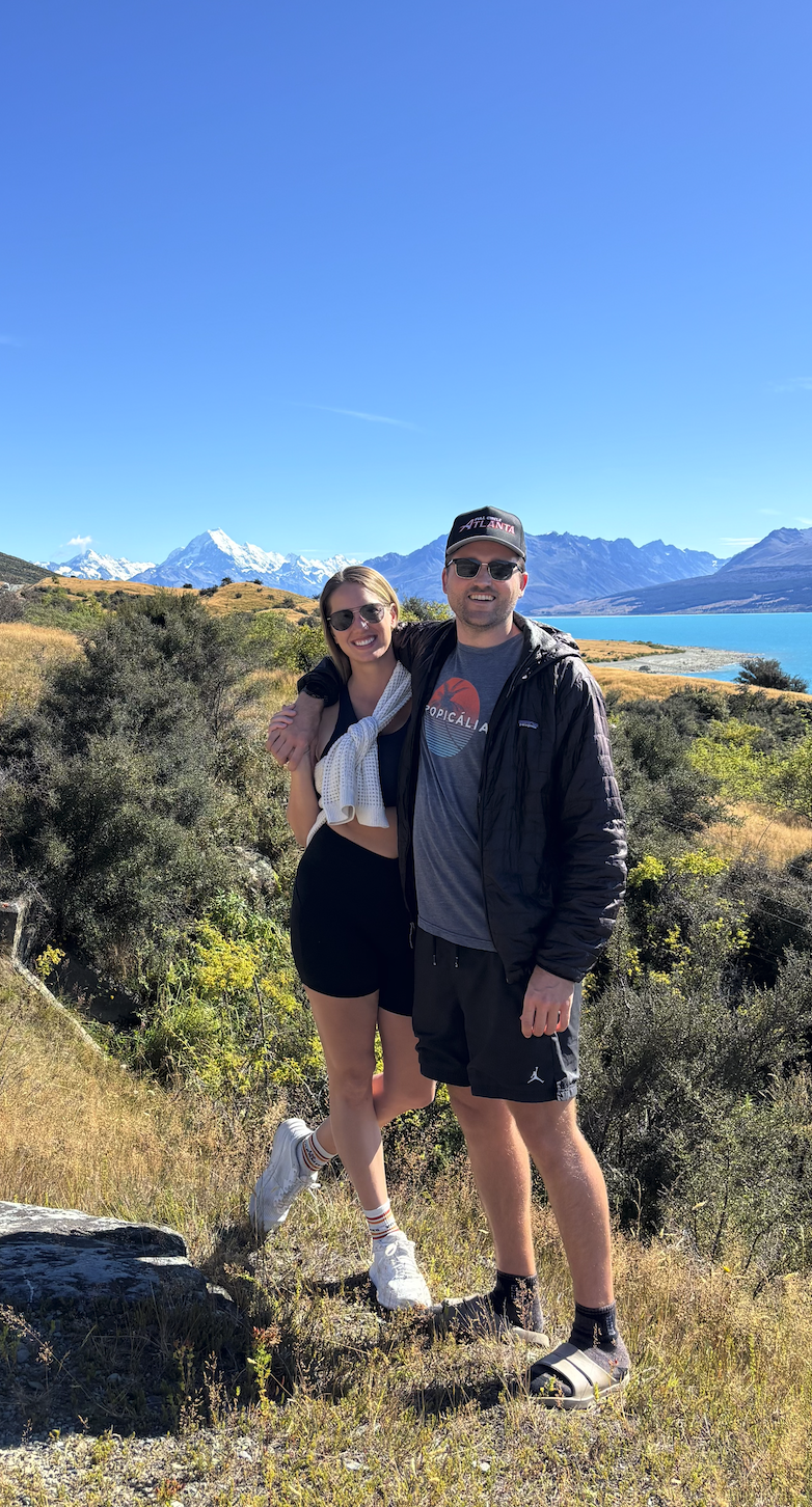 Couple on road trip at Mt. Cook on New Zealand South Island