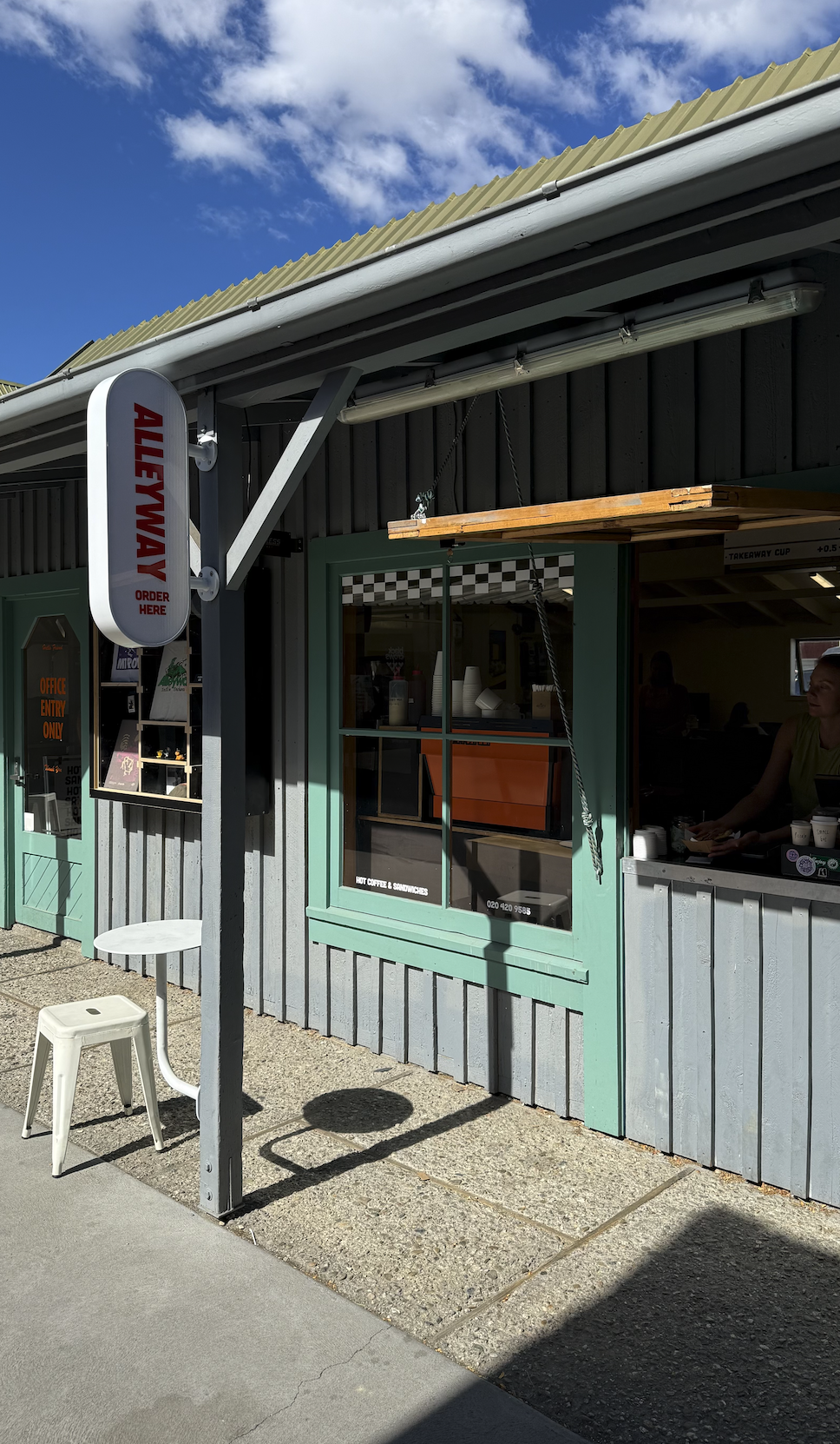 retro alleyway storefront in wanaka new zealand 