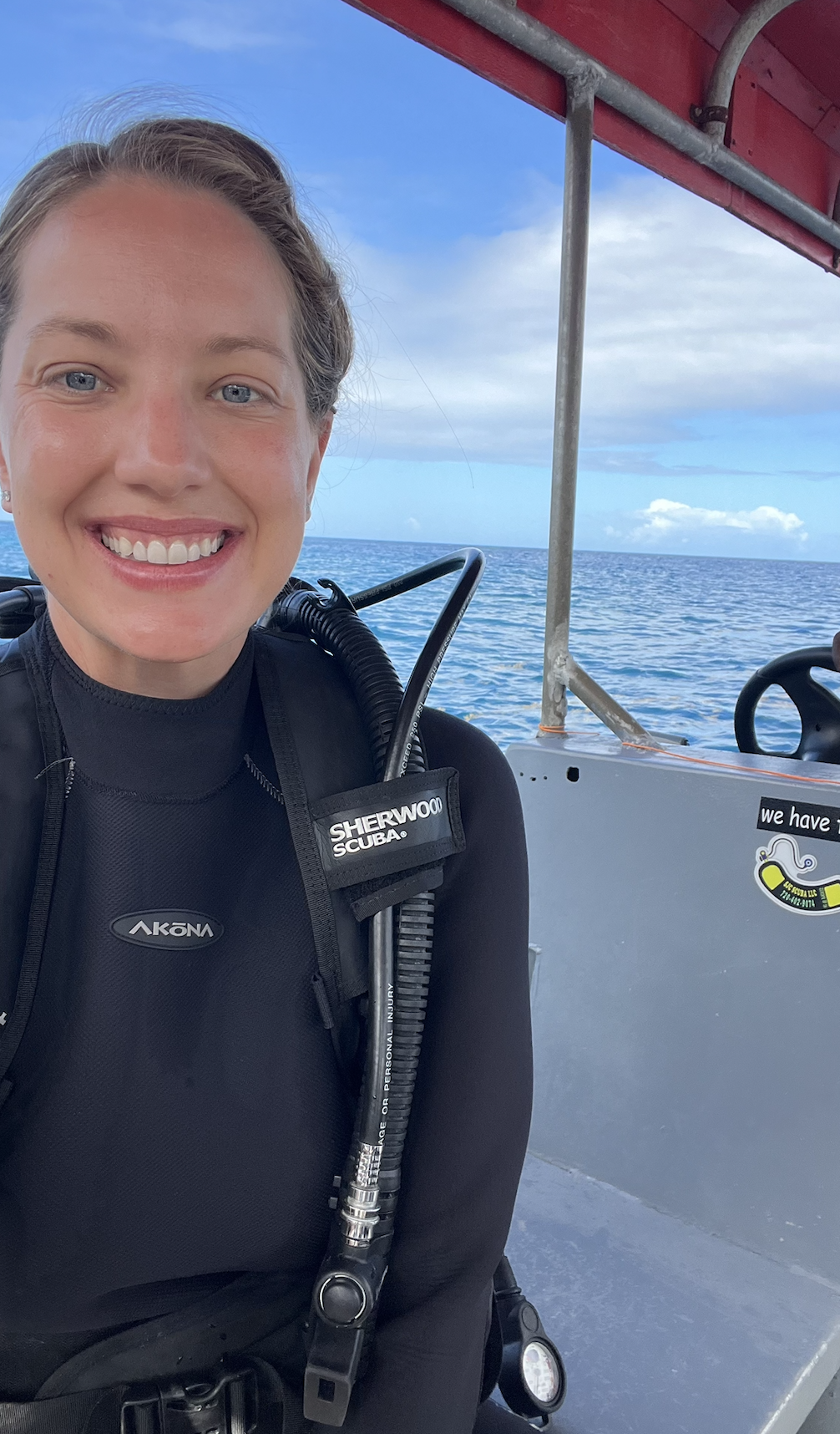 scuba diver on boat Dominica
